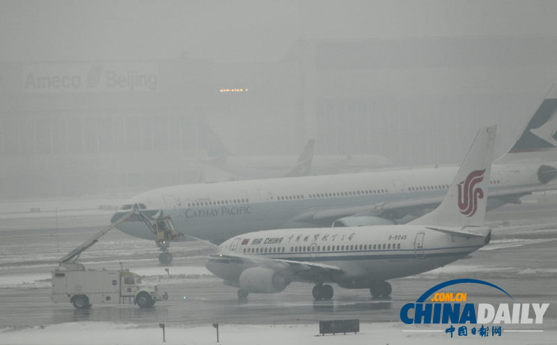 北京首都機場全力確保雪天正常運行