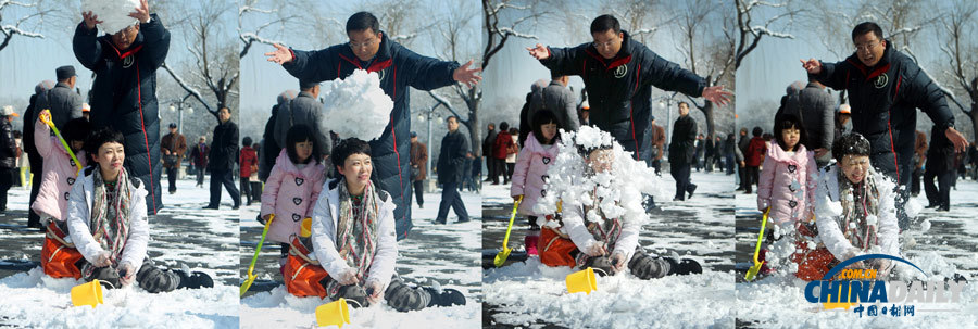 北京春分迎強降雪 頤和園游人“雪戰(zhàn)”