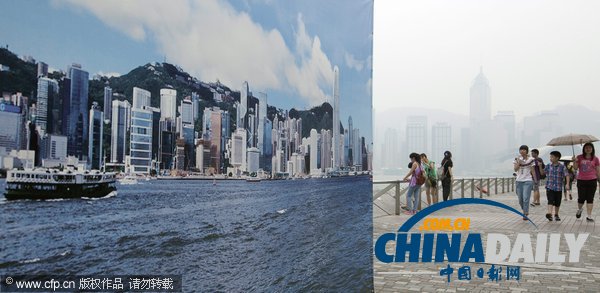 香港遭遇霧霾天 游客被迫與“假藍天”合影留念