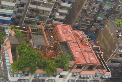 六樓頂蓋“七樓”鄰居礙于面子不敢講（圖）