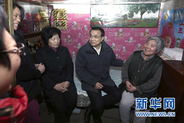 習(xí)近平李克強寒冬問民生