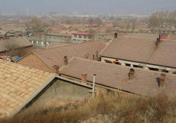 李克強考察赤峰棚戶區：一定讓你們住上新房