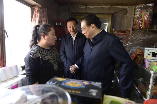 李克強考察赤峰棚戶區：一定讓你們住上新房