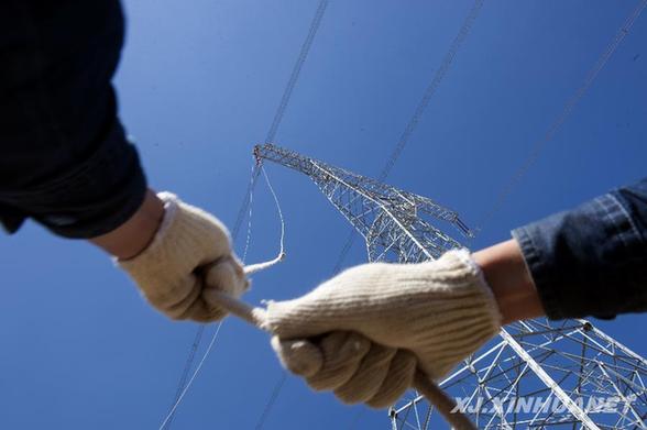 疆電外送工程實現“煤從空中走、電送全中國”