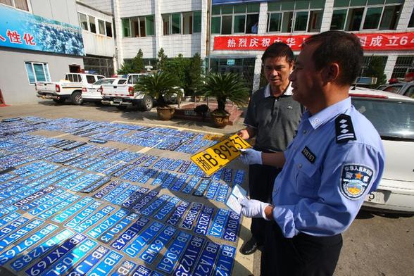 “菲特”過后 寧波大量車牌等車主認領