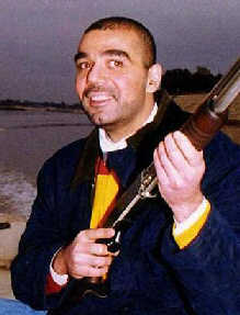 Rumsfeld says US to release photos of Saddam's sons