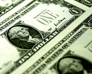 Dollar plummets to eight month low against euro
