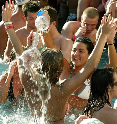 U.S. spring breakers play at swimming pool party in Acapulco, Mexico, March 21, 2005, during the annual eight weeks of revelry as U.S. students descend on Mexico's most popular beach resort to let their hair down.