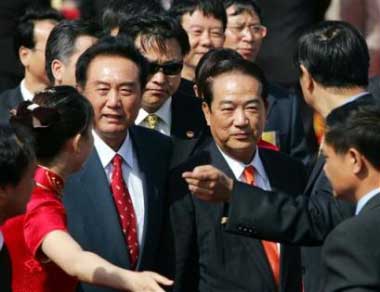 James Soong, right, the head of Taiwan's second-largest opposition party, the People First Party, is accompanied by Chen Yunlin, Director of the Taiwan Affairs office of the 4Communist Party, at Xi'an airport in China Thursday May 5, 2005. Soong arrived in China on a visit aimed at easing tensions between the mainland and Taiwan, days after the chairman of Taiwan's main opposition Nationalist party, Lien Chan, returned from a weeklong tour. (AP