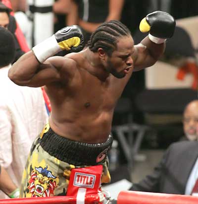 World Boxing Organization Champion Lamon Brewster celebrates after knocking out Andrew Golota, 53 seconds into the first round during their World Boxing Organization Heavyweight title fight in Chicago May 21, 2005.