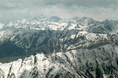 An aerial view of mountains is seen around Kargil, India, Saturday, June 11, 2005. The Indian Prime Minister Manmohan Singh is on a three-day visit to the remote Ladakh district in northwest Kashmir that began Friday to inaugurate two-power projects and to interact with Indian soldiers at Siachen, the world's highest battlefield. (AP