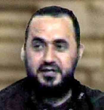 The leader of al Qaeda's wing in Iraq, Jordanian militant Abu Musab al-Zarqawi, is seen in this recent photograph handed out by the Iraqi Interim Government on March 7, 2005. Jordanian authorities have arrested Issam Barqawi, Zarqawi's spiritual mentor, al Jazeera television said on July 5, 2005.