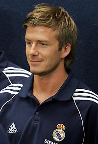 Real Madrid's David Beckham smiles during a ceremony where the team exchanged gifts with Chicago Mayor Richard Daley at City Hall in Chicago July 15, 2005.