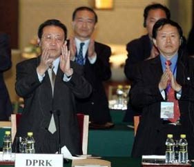 North Korea has agreed in principle to end its nuclear weapons project in return for security and economic commitments from the United States, in a major move towards peaceful settlement of a potential firestorm in East Asia.