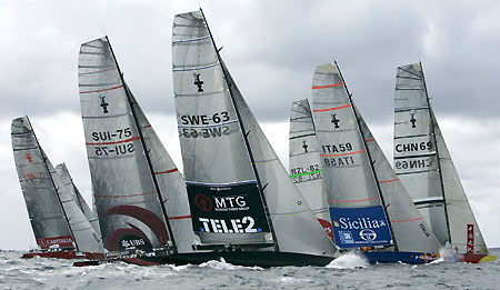 Boats are seen in action during their race in the Louis Vuitton Act 9 of the 32nd America's Cup, off the Sicilian port town of Trapani in southern Italy October 9, 2005. Alinghi won the Act 9 ahead of BMW Oracle Racing (USA 76), which finished second, and Emirates Team New Zealand (NZL 82), which finished third.