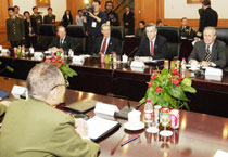 S. Defense Secretary Donald Rumsfeld (R) speaks at the start of a meeting with Chinese Defense Minister Cao Gangchuan at the Defense Ministry's Bayi Building in Beijing October 19, 2005. Rumsfeld is making a brief two-day visit to Beijing, his first visit to China in his current tenure as defense secretary