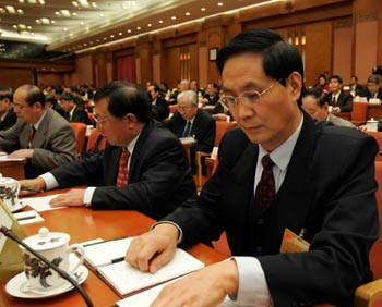 A revised Personal Income Tax Law was adopted by China's top legislators yesterday, raising the threshold for monthly personal income tax from 800 yuan (US$99) to 1,600 yuan (US$198) a move that will help ease the burden on low-wage earners.