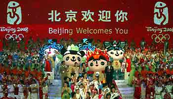 Huge inflated cartoon figures of the five Beijing Olympic mascots walk on stage at the Workers' Stadium during a gala show on Friday evening.