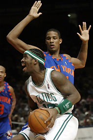 ortland Trail Blazers center Ha Seung-jin of South Korea (L) battles for rebound position with Utah Jazz forward Jarron Collins during the first quarter of their NBA game in Portland, Oregon December 4, 2005.