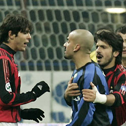 Milan's Kaka (L) argues with Inter Milan's Juan Sebastian Veron (C) as team mate Gennaro Gattusa tries to stop them during their Italian Serie A soccer match at the San Siro stadium in Milan December 11, 2005.