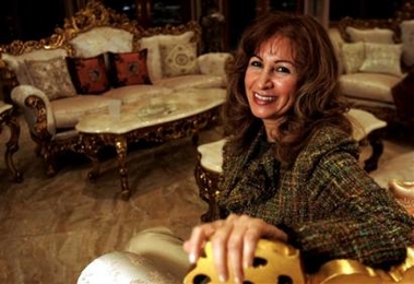 Shatha Atiya sits in the living room of her home in Fort Lauderdale, Fla. Thursday, Dec. 29, 2005 as she speaks to the press about her son Farris Hassan who traveled by himself to Iraq for his Christmas vacation without telling his parents.