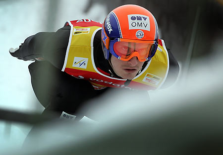 Czech Republic's Janda speeds down the ski jump during the second jumping of the four hill ski jumping tournament in Garmisch Partenkirchen