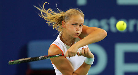Groenefeld of Germany plays shot during mixed doubles match against Dulko and Dulkon of Argentina during Hopman Cup in Perth 