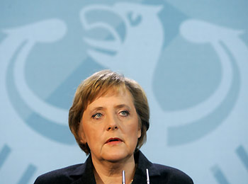 German Chancellor Angela Merkel makes a statement at the Chancellery in Berlin in this January 3, 2006 file photo. Merkel, in an interview published days before her first visit to the United States, said Washington should close its Guantanamo Bay prison camp and find other ways of dealing with terror suspects. "An institution like Guantanamo can and should not exist in the longer term," Merkel said in an interview with the weekly magazine Der Spiegel published on January 7, 2006.
