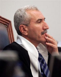 The chief judge in Saddam Hussein's trial has submitted his resignation after becoming fed up with criticism that he had let the proceedings spin out of control, a court official said Saturday.