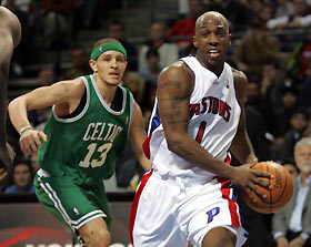 Detroit Pistons guard Chauncey Billups (R) drives past Boston Celtics guard Delonte West during the first half of their NBA game in Auburn Hills, Michigan January 16, 2006.