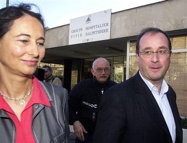 French socialist party secretary general Francois Hollande, right, and his companion Segolene Royal, leave the Pitie-Salpetriere hospital after visiting Paris Mayor Bertrand Delanoe, in Paris in this Oct.6, 2002 file photo.