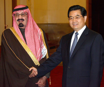 China and Saudi Arabia signed five agreements yesterday, including one on increased co-operation in oil, natural gas and mineral deposits.