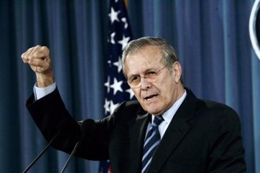 Secretary of Defense Donald H. Rumsfeld gestures as he answers reporters questions during a news conference at the Pentagon, Wednesday, Jan. 25, 2006.