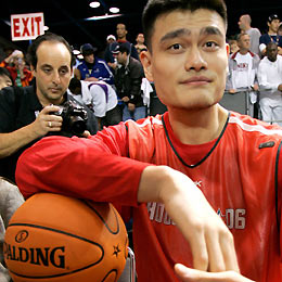 ao Ming of the Houston Rockets poses before the Western Conference practice for the NBA All-Star game in Houston February 18, 2006. The All-Star game will be held February 19.