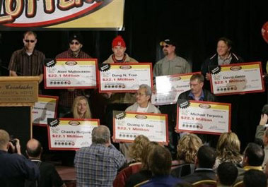 Eight workers at a Nebraska meatpacking plant are really bringing home the bacon now: They stepped forward Wednesday to claim the biggest lottery jackpot in U.S. history — US$365 million.