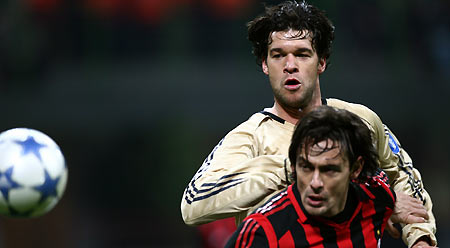 AC Milan's Filippo Inzaghi (front) challenges Michael Ballack of Bayer Munich during their Champions League first knockout round second leg soccer match in Milan, Italy March 8, 2006.