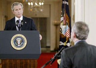 Bush vows US will finish job in Iraq