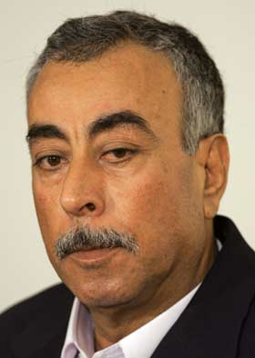 Saddam and his aids in court