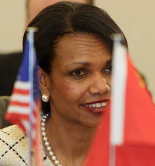 FM Li Zhaoxing holds talks with Rice