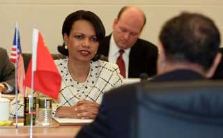 FM Li Zhaoxing holds talks with Rice