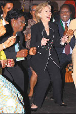 Clinton sets 'tough love' tone on Africa