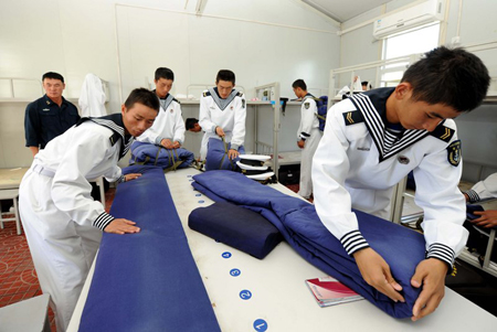 Parade soldiers start to retreat from drill camps