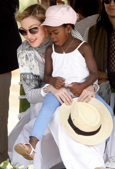 Madonna and her adopted child at site of her Raising Malawi Girls Academy