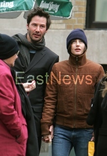 Keanu Reeves strolls with girlfriend