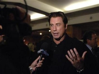 John Travolta cashed in male ego for