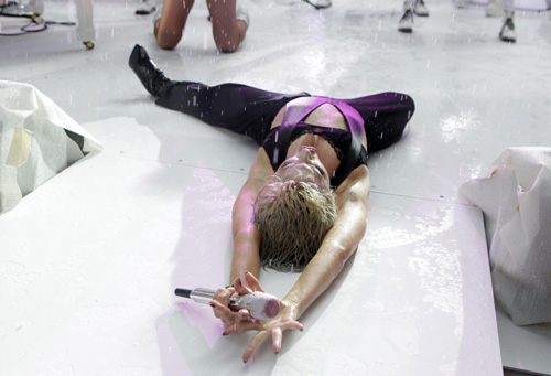 Lady Gaga performs during a rain shower on NBC's 