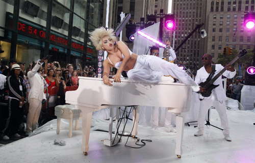 Lady Gaga performs during a rain shower on NBC's 
