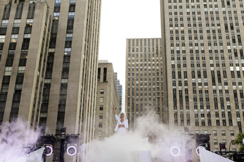 Lady Gaga performs during a rain shower on NBC's 