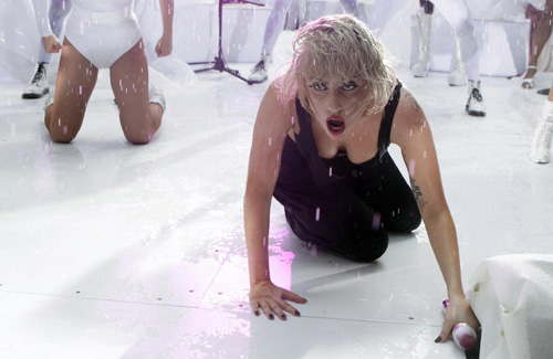 Lady Gaga performs during a rain shower on NBC's 