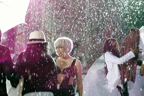 Lady Gaga performs during a rain shower on NBC's 